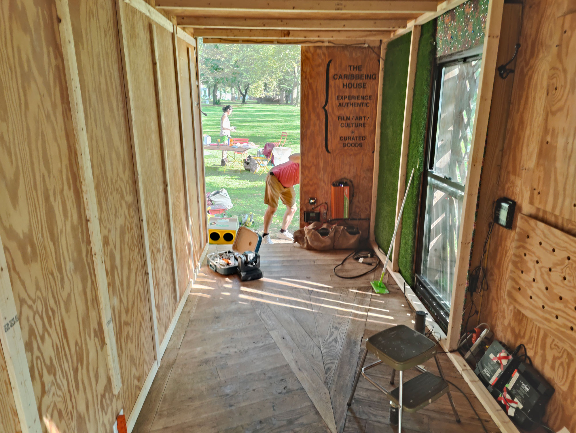 Christina and Nic outside the shipping container